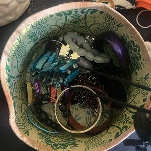 A bunch of bracelets with basket over 35 in the box